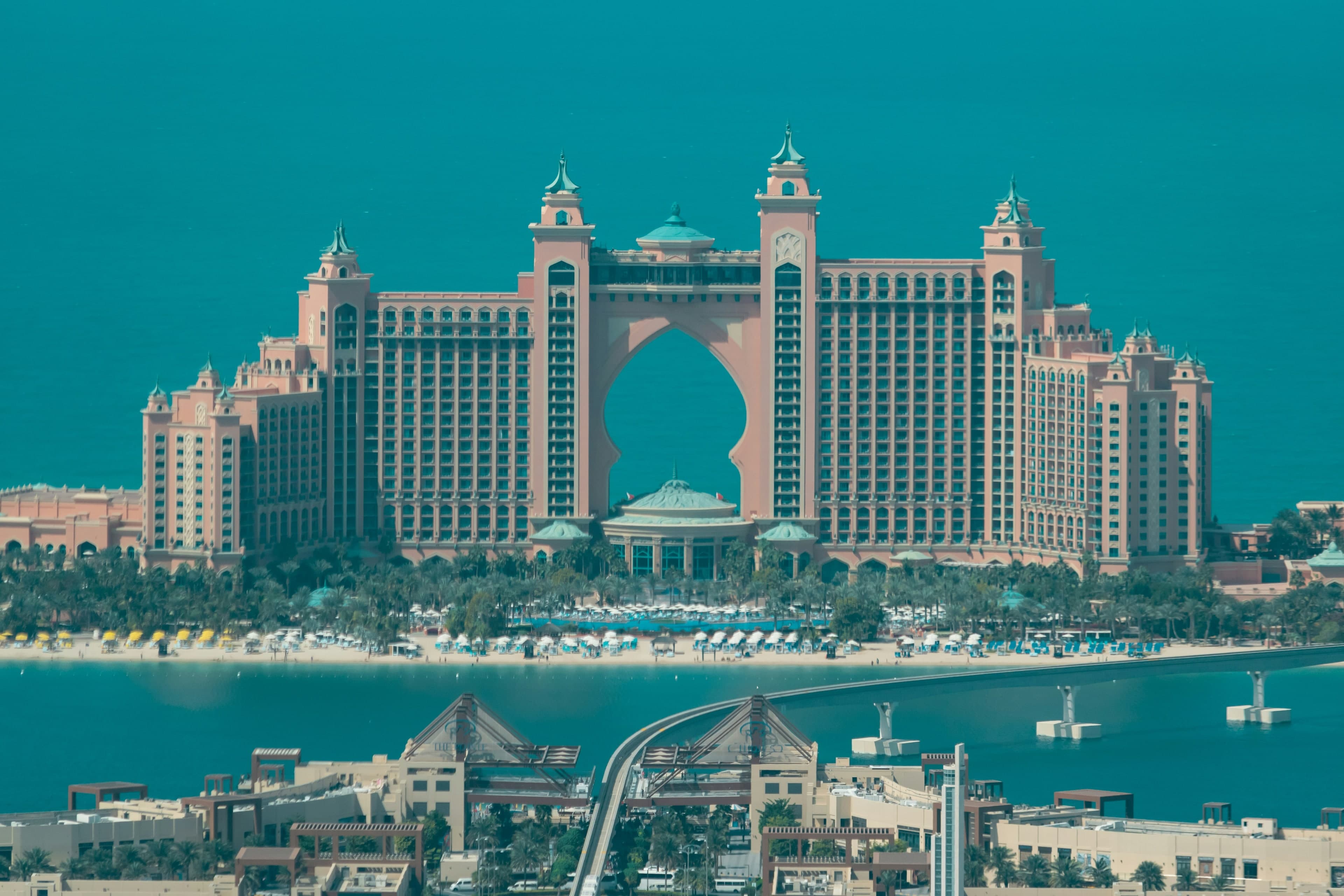 Atlantis The Palm on the crescent, with the monorail line crossing the water in front of it